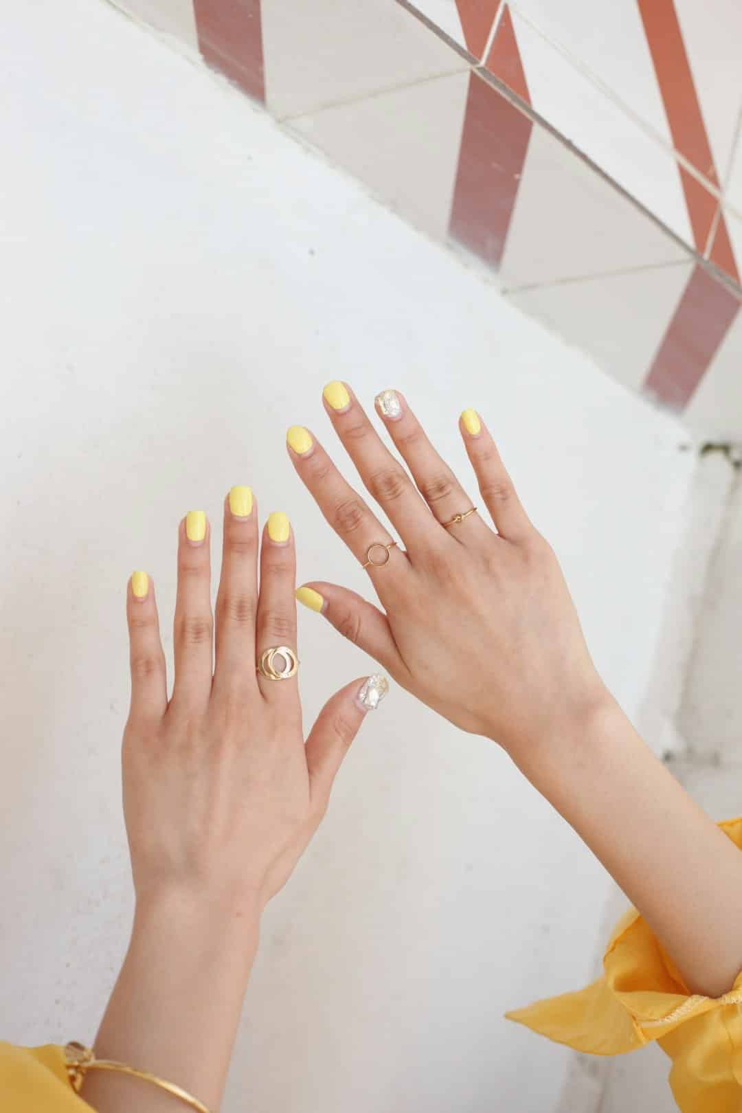 Understanding the Meaning Behind gingerbread nails infection person wearing silver diamond ring